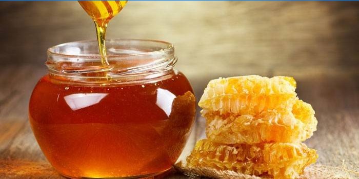 Honig im Glas und Waben